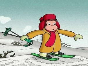 Zvedavý George Opica na lyžiach